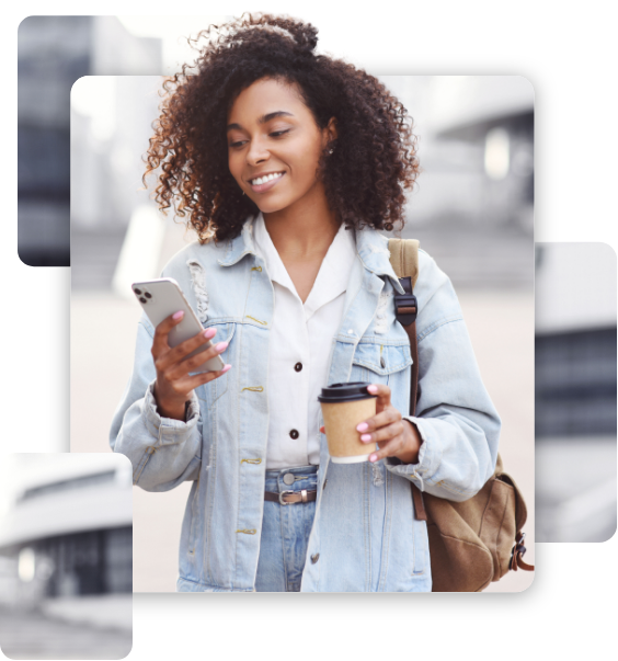 A woman handing a mobile phone and a cup